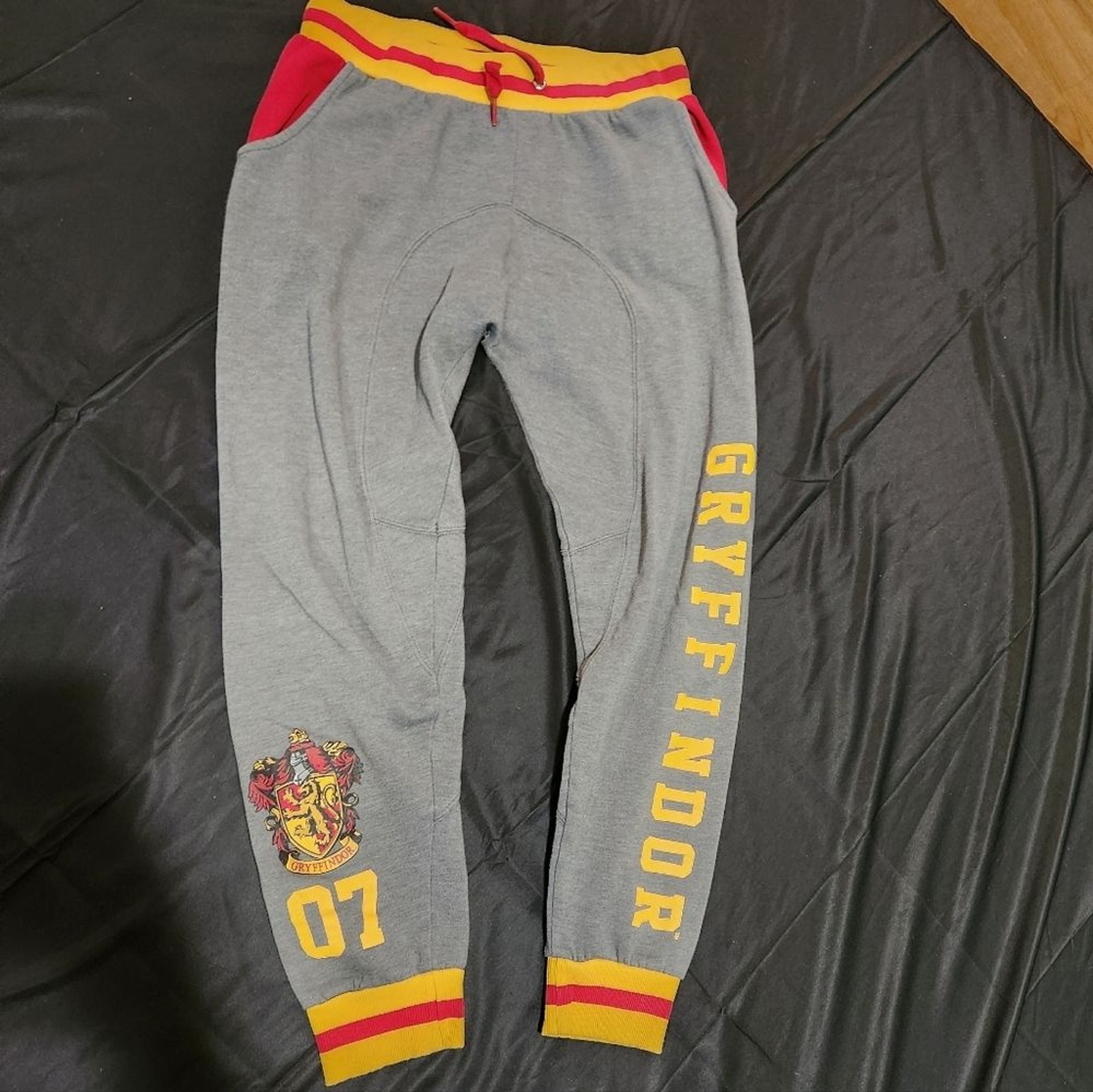 Warner Bros. Harry Potter Gryffindor Gray Joggers with Red and Yellow Accents L