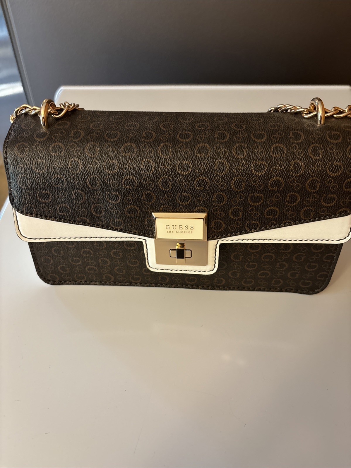 GUESS NWT Women’s Logo Handbag With Gold Tone Chain And Hardware Color -Natural