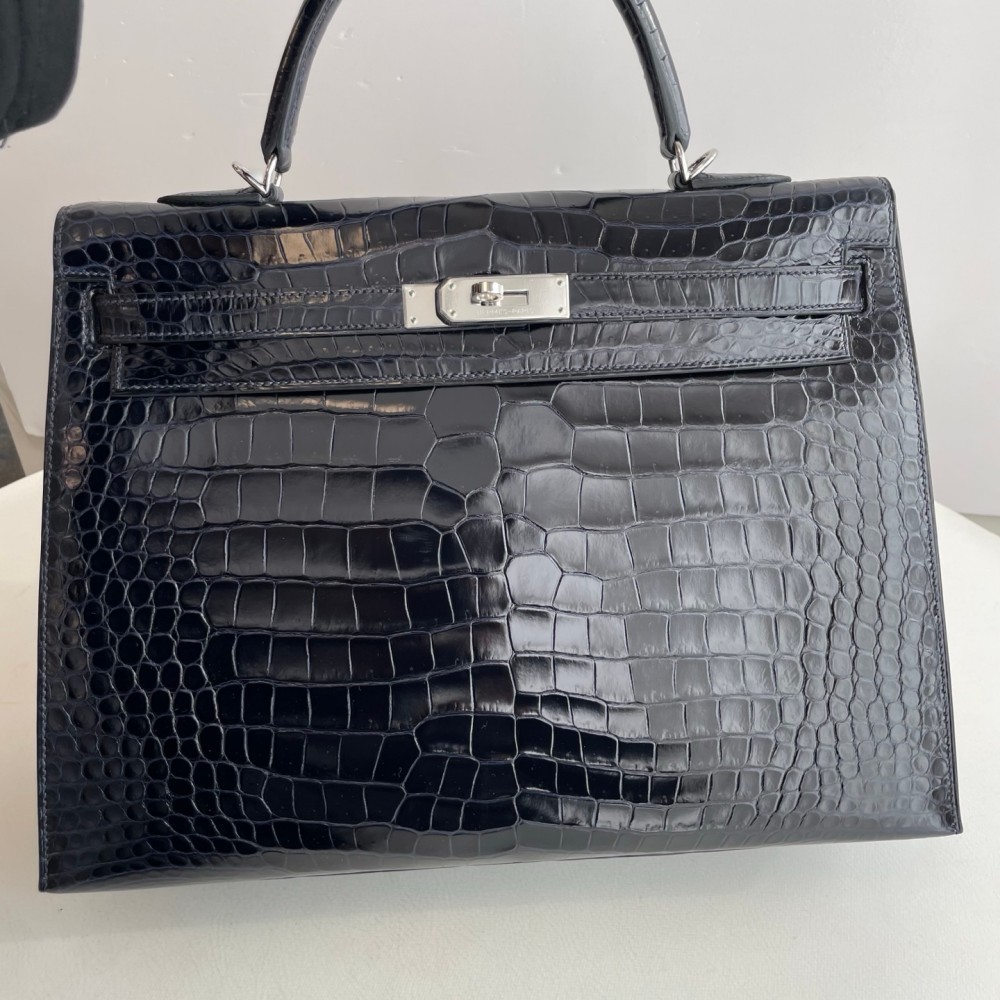 Hermes Kelly 35 in inverted V leather blue with silver hardware.