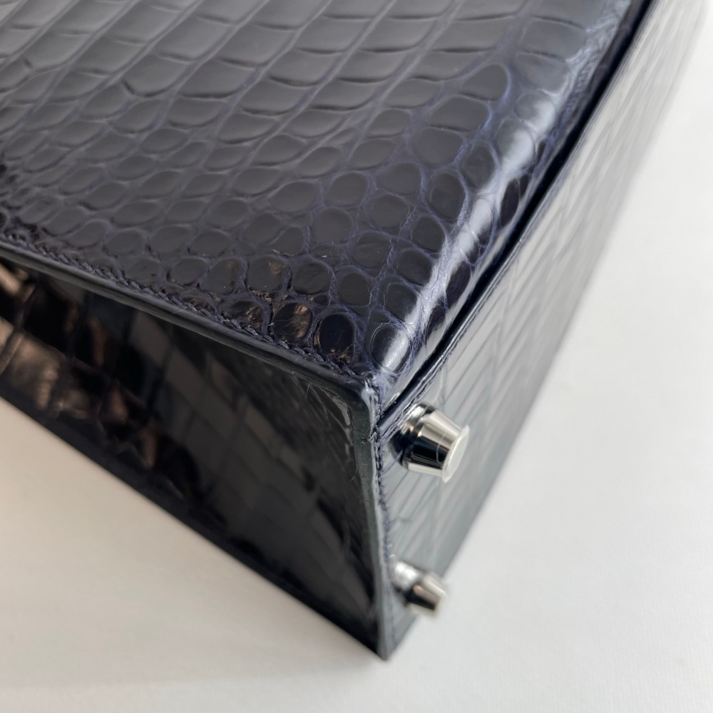 Hermes Kelly 35 in inverted V leather blue with silver hardware.
