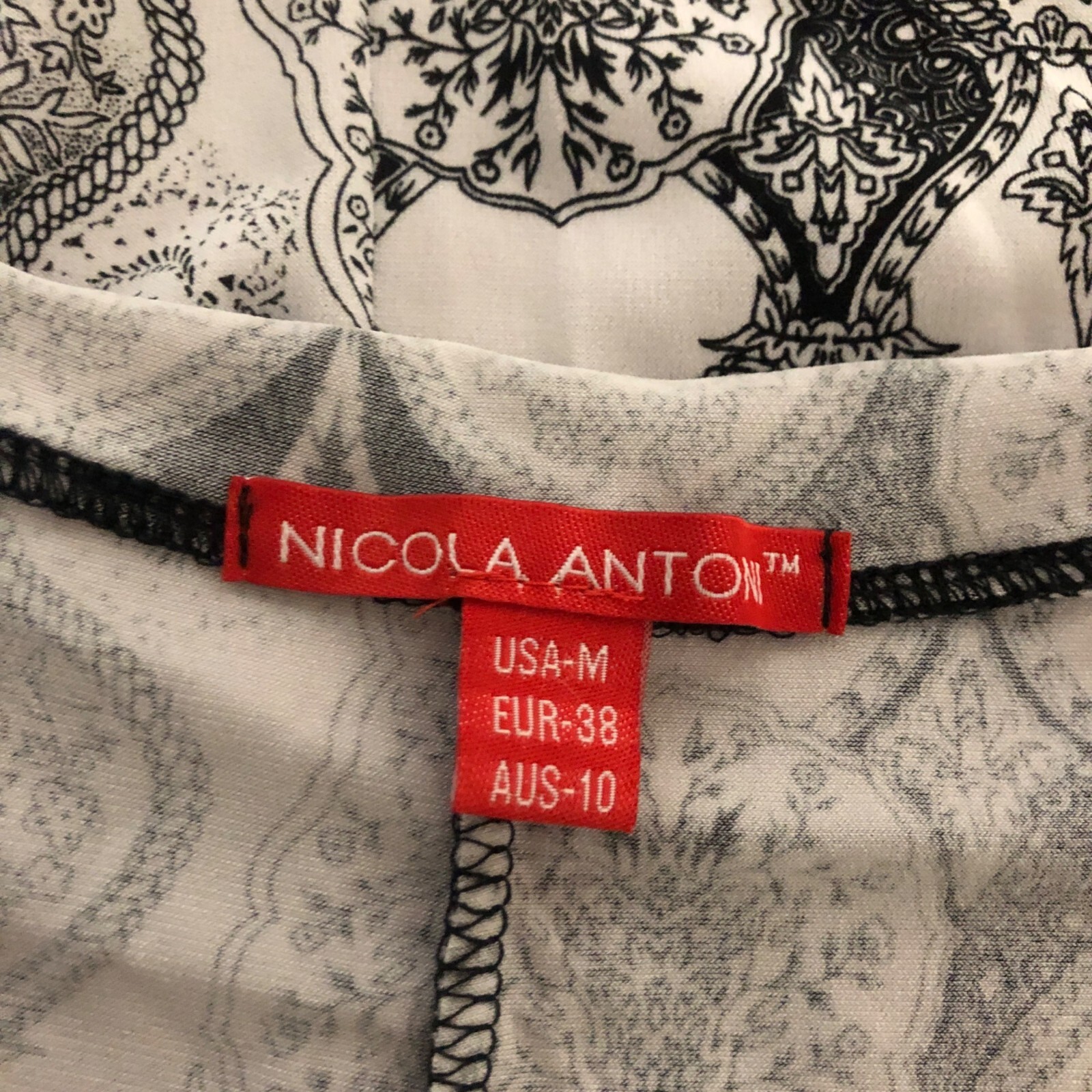 Nicola Anton Tunic Womens Size Medium Black White Raw Edge Neck Hem Stretch Top