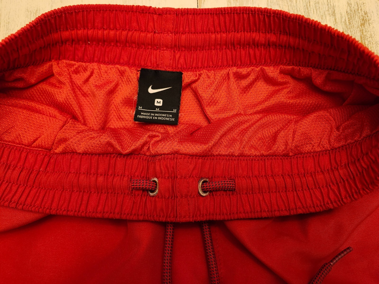 Nike men’s medium M swim trunks red gray swoosh mesh lined drawstring