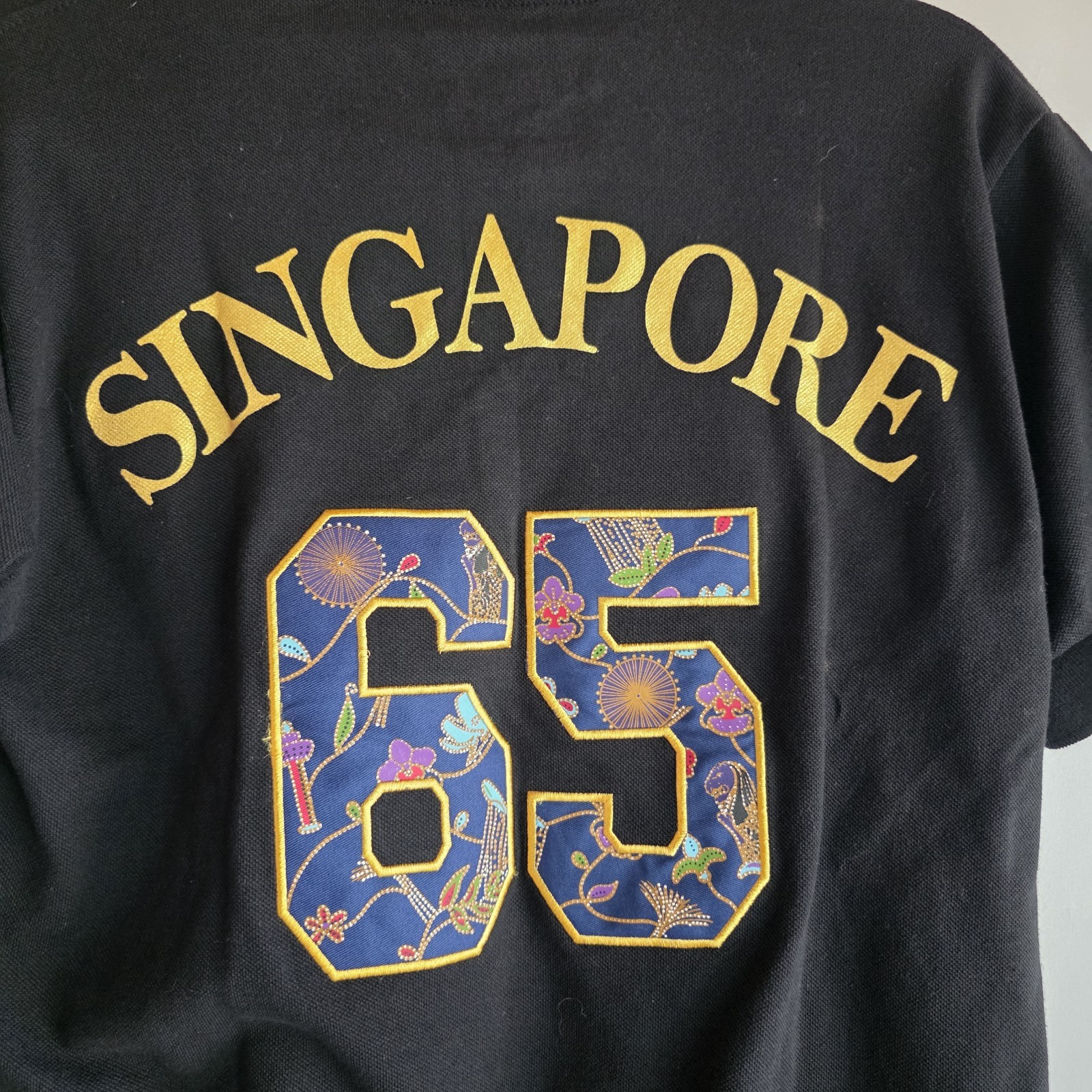 Guardian Angel Polo Men M Singapore 65 Lion City Embroidered Gold Print Black