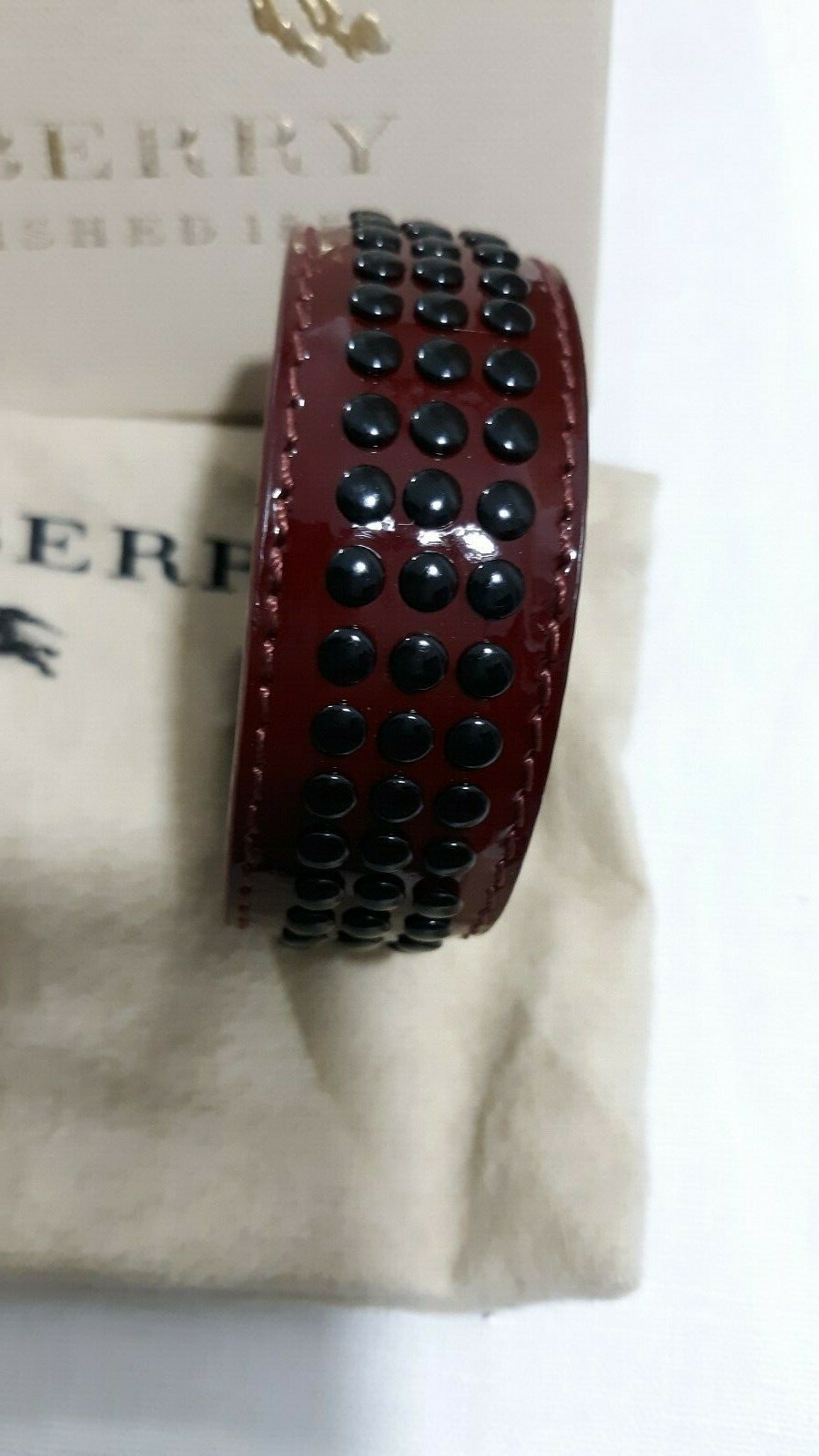 BURBERRY LEATHER CUFF BANGLE BERRY RED BLACK GROMMETS NEW TAGS UNISEX
