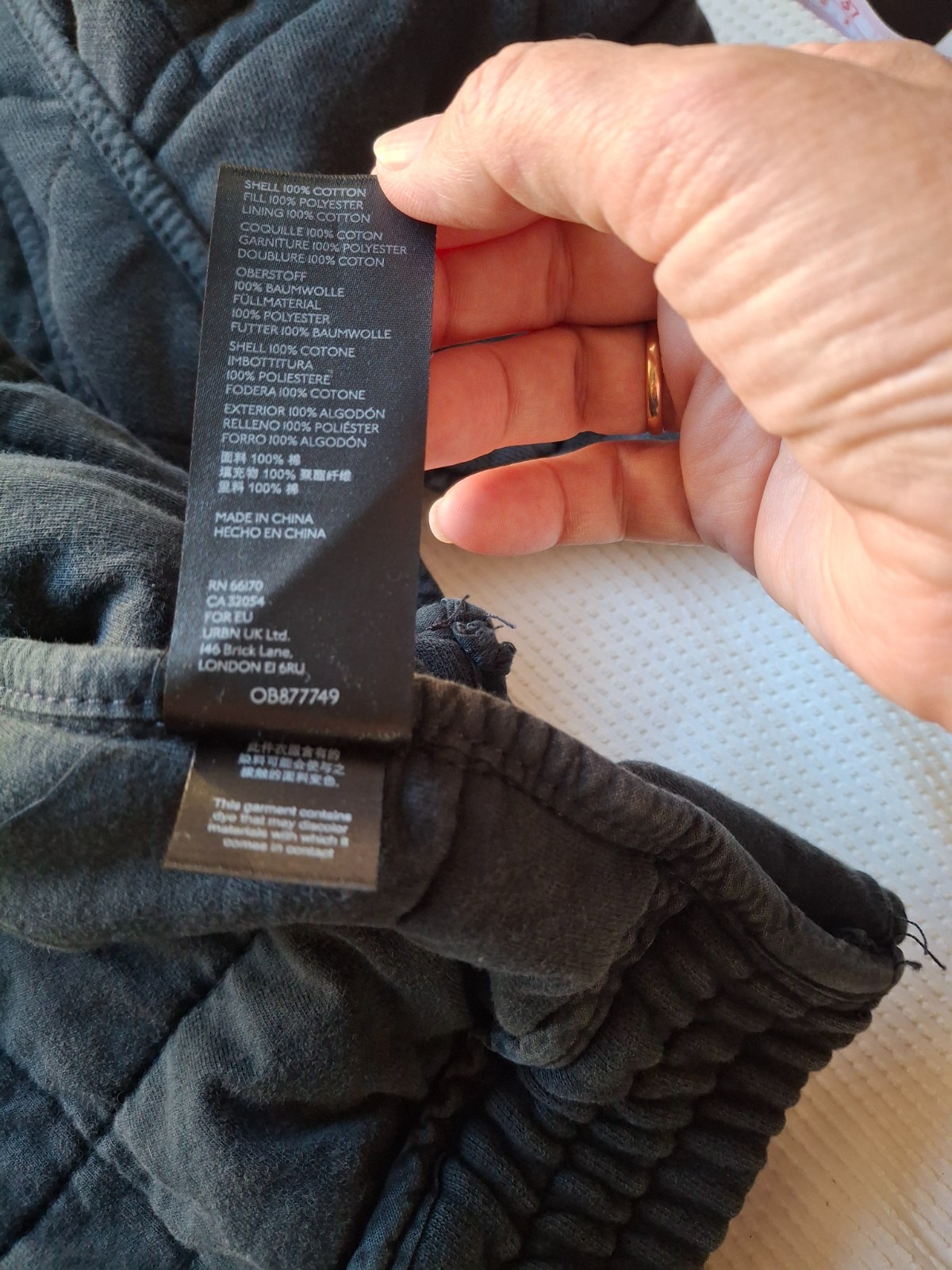 Free People “Dolman” knit quilted zip-up jacket, washed black, size L