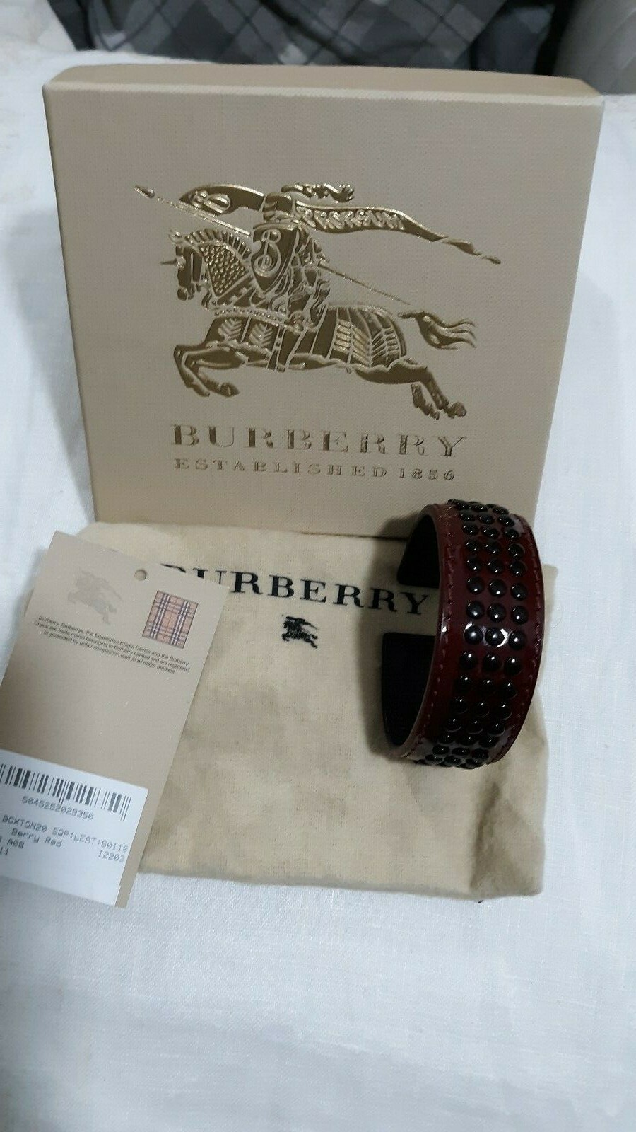 BURBERRY LEATHER CUFF BANGLE BERRY RED BLACK GROMMETS NEW TAGS UNISEX