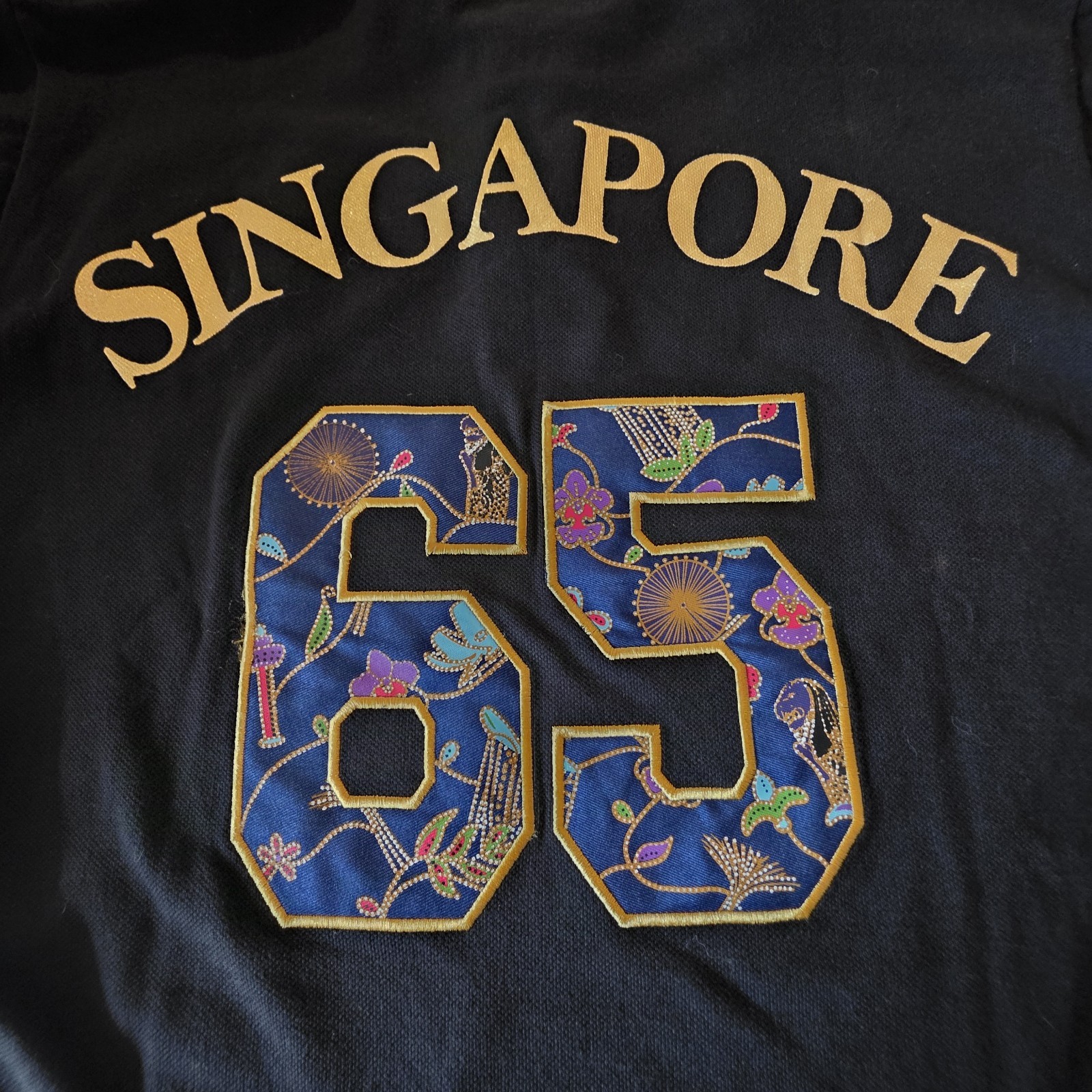 Guardian Angel Polo Men M Singapore 65 Lion City Embroidered Gold Print Black