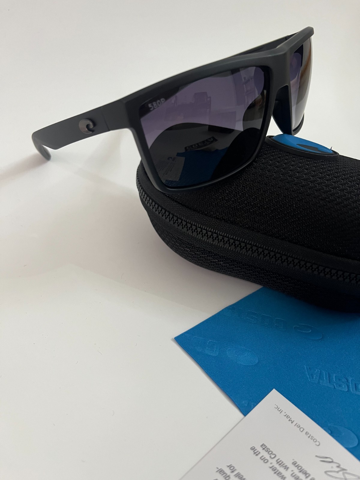 COSTA polarized – Smoke-Clear Frame W/ Blue Polarized Sunglasses 580
