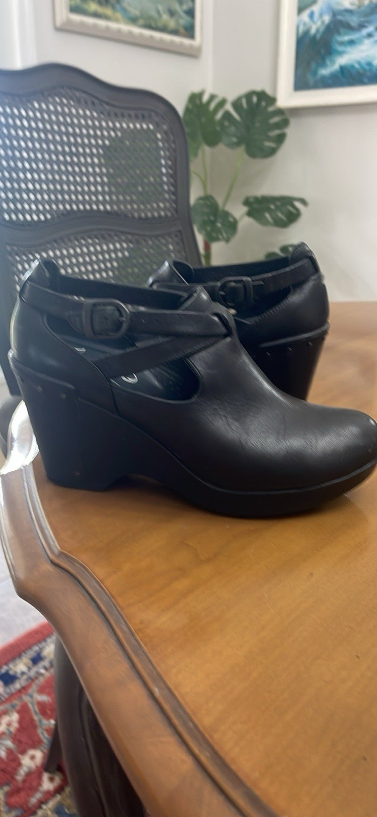 Dansko 37 Black Clogs with Buckle Strap and Metal Tooling on the Heel