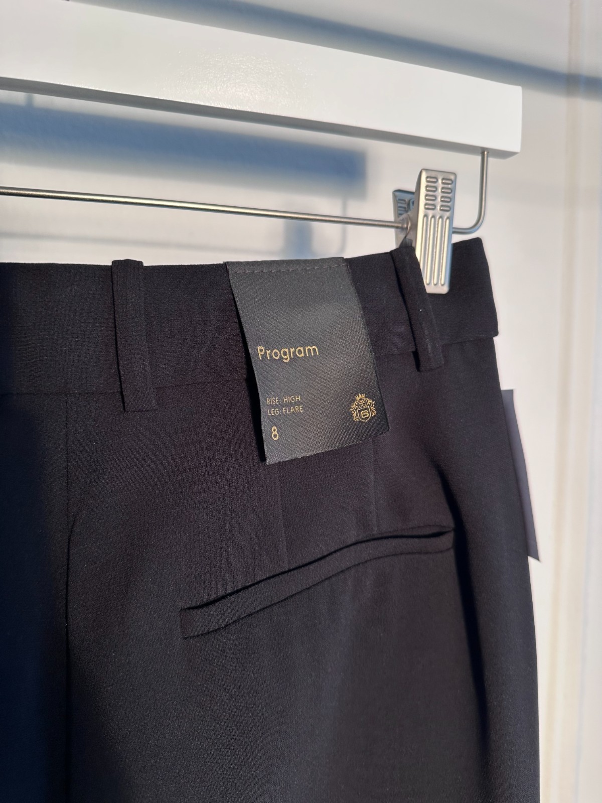 Babaton dress pants program black trousers size 8 high rise flared leg Aritzia