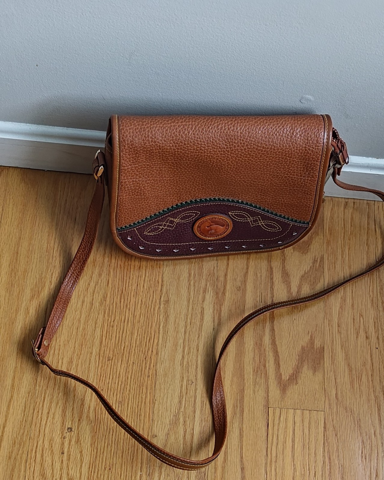 Dooney & Bourke All Weather Leather Duck Bag Color = Brown
