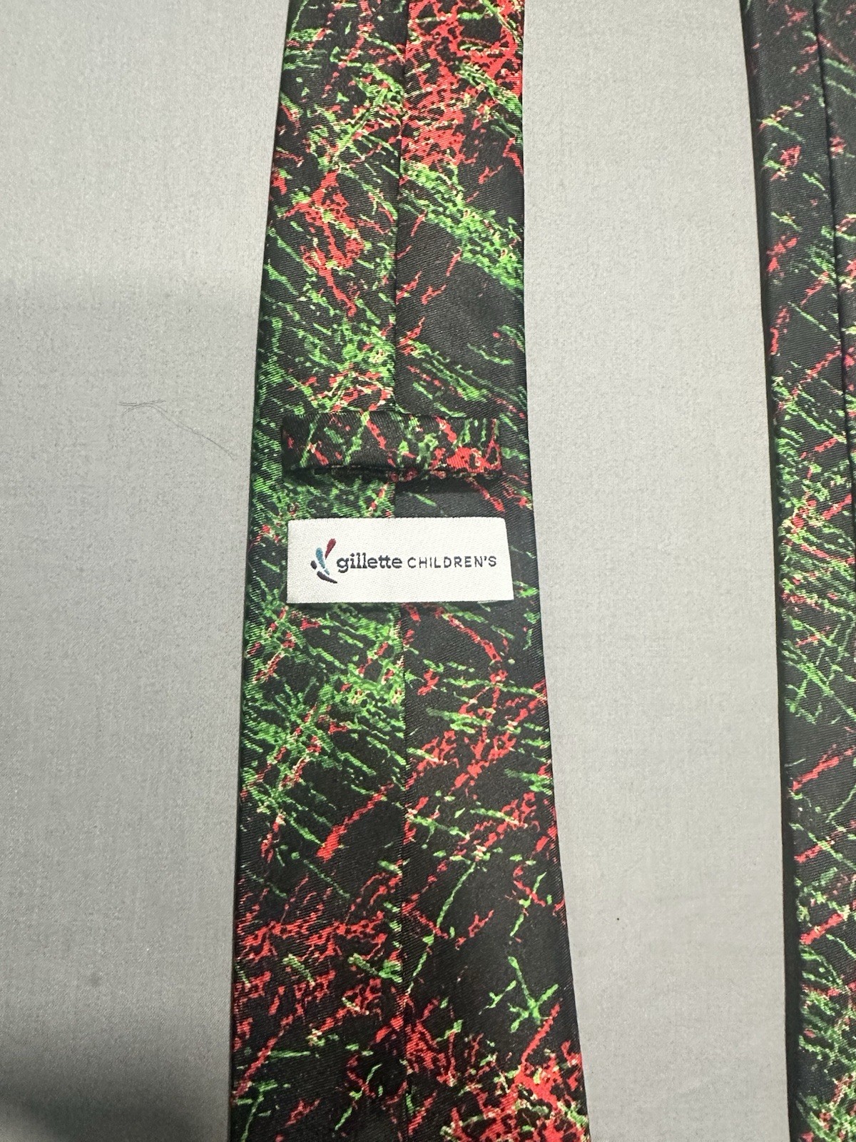 VTG Black With Red/Greem Splatter Necktie Delta Pilots