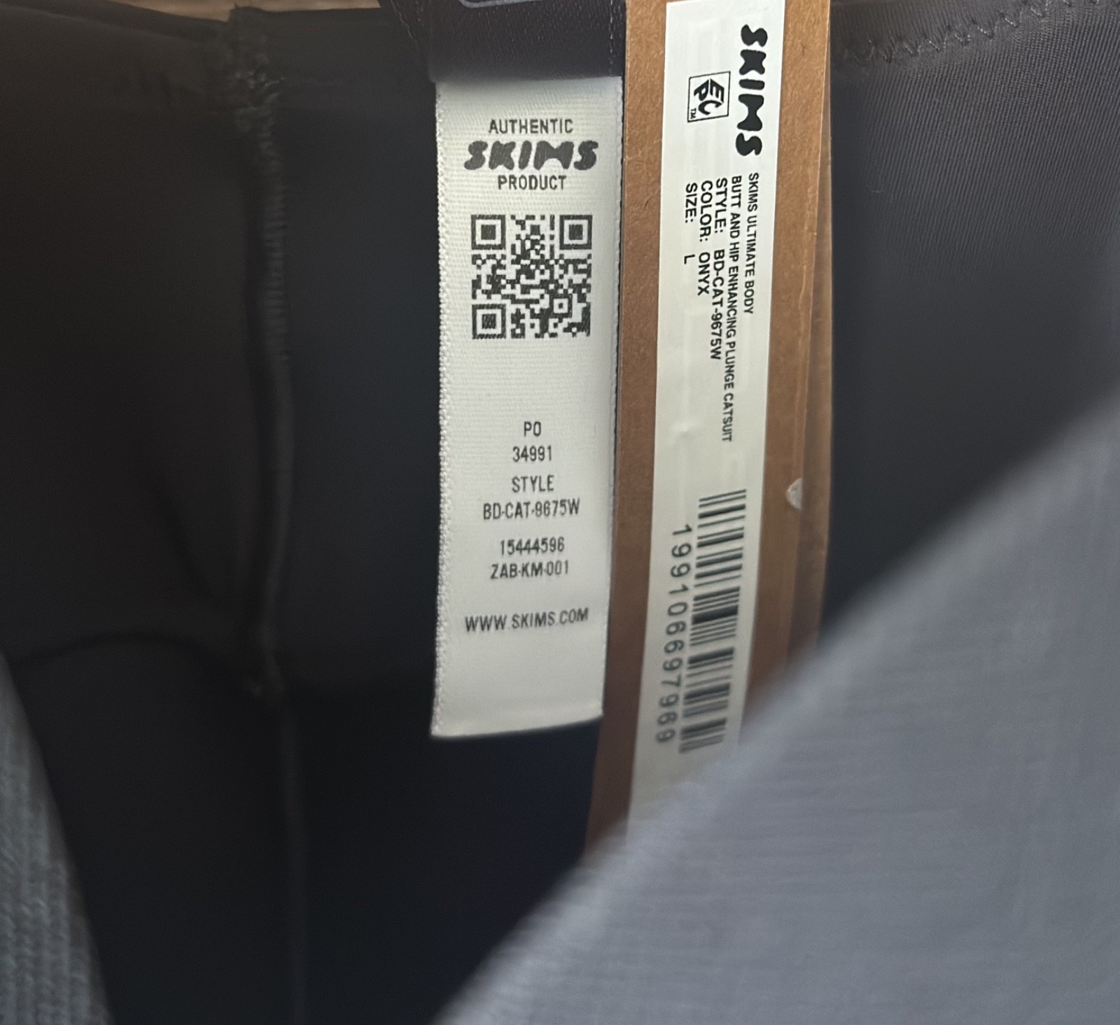 SKIMS ULTIMATE BODY BUTT AND HIP ENHANCING PLUNGE CATSUIT w/ TAGS ONYX L Disc,,,