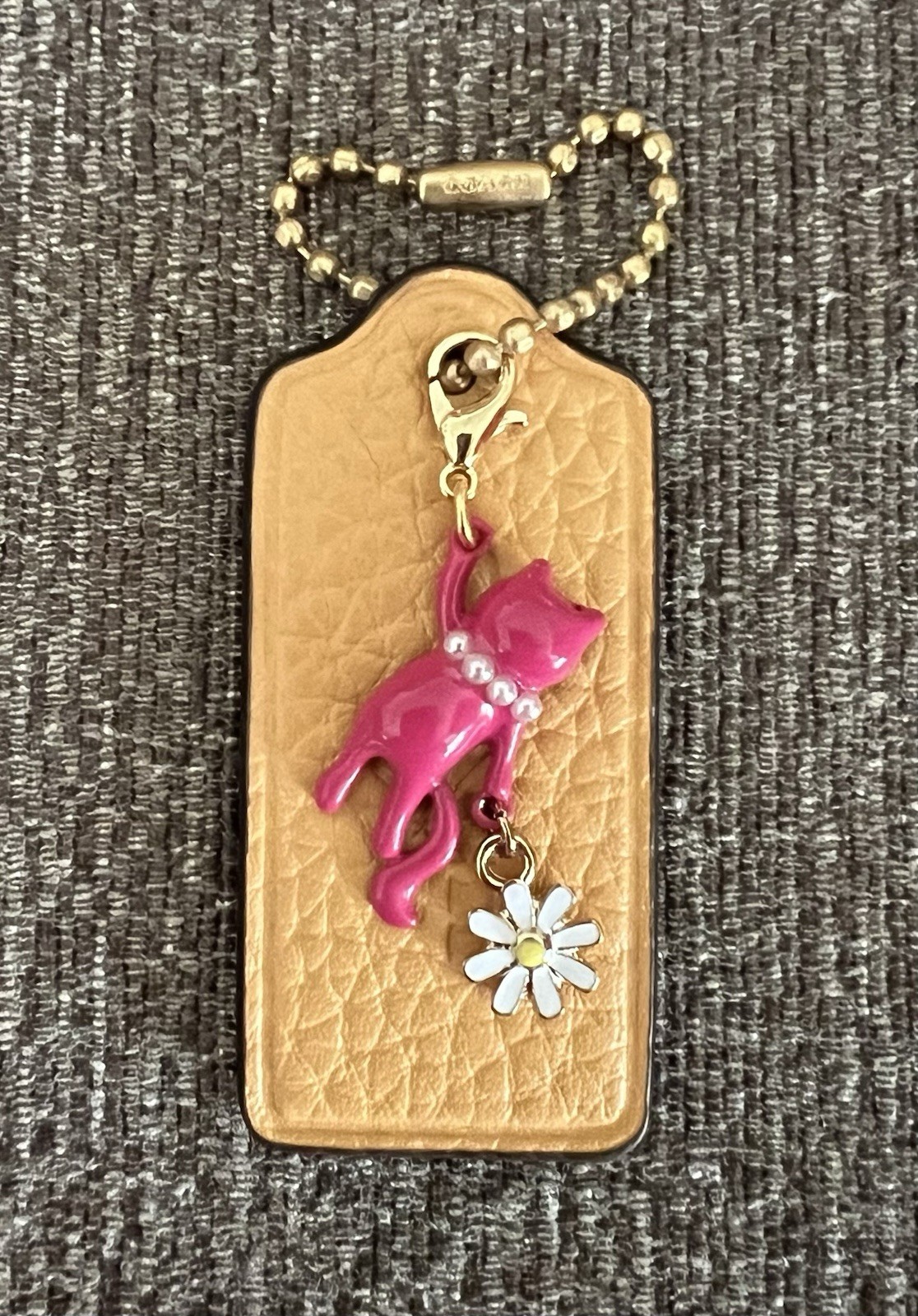 Genuine Coach 2.25” Marigold Leather Hangtag with Pink Kitty Cat Daisy Charm New