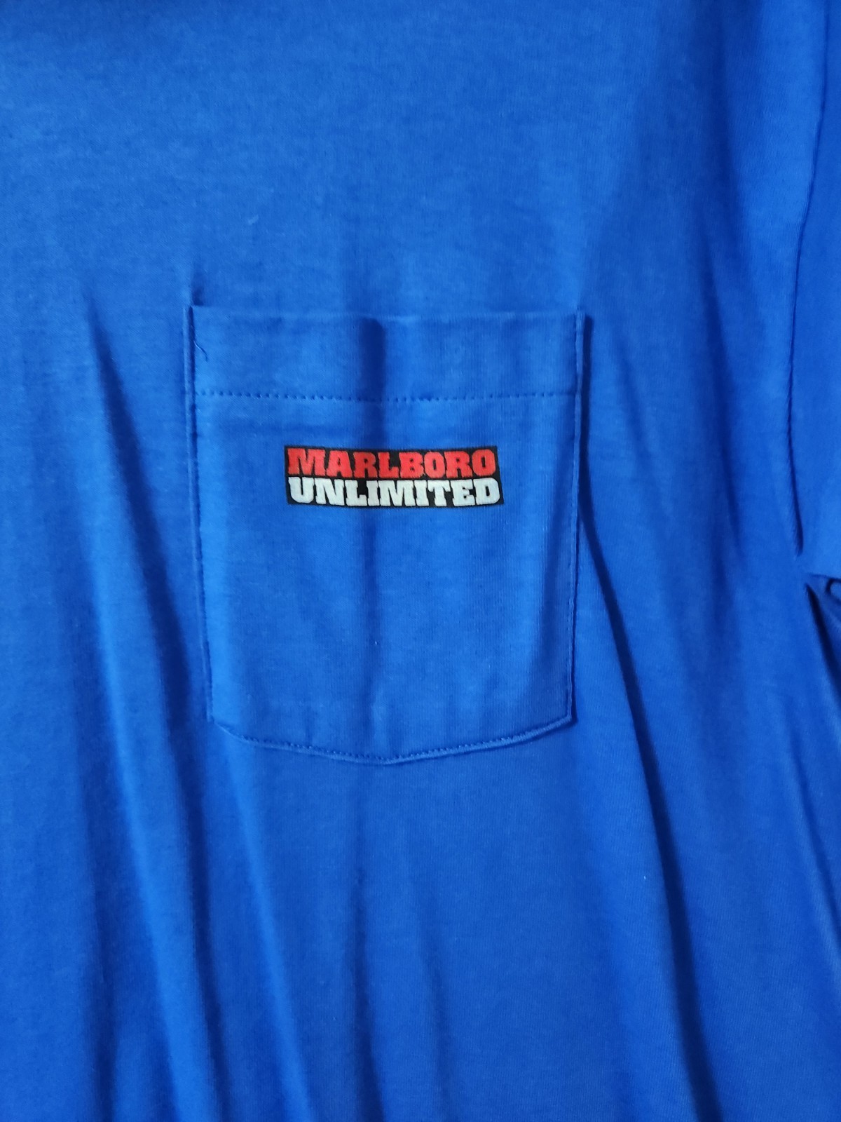 Vintage Blue Marlboro Unlimited Tshirt, Size XL. Never Worn, On Back Lone Wolf