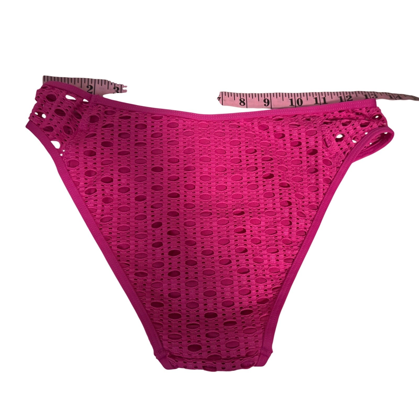 Carmen Mare Valvo Ultra Pink bikini bottom intricate crochet detail side peek