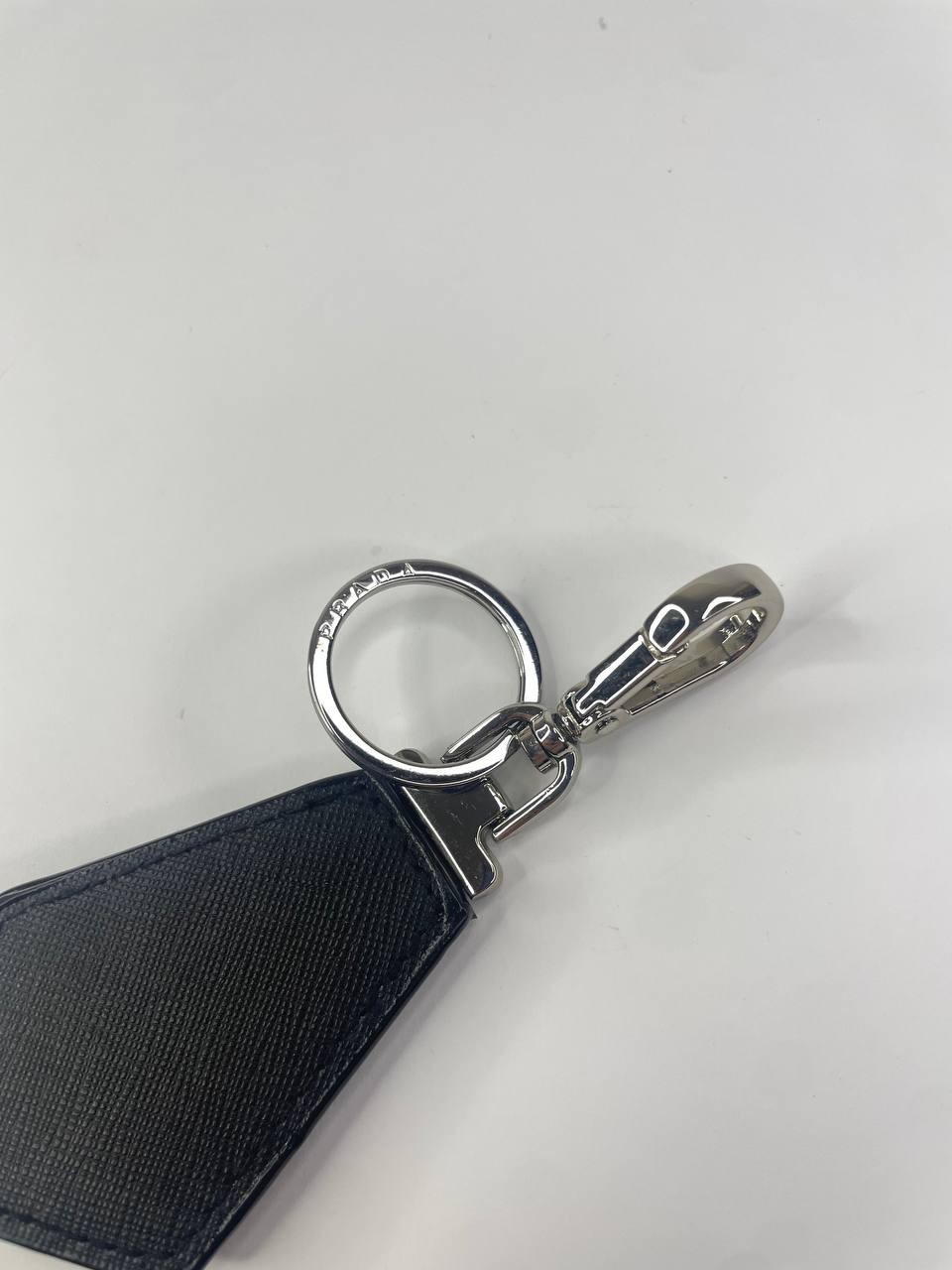 Prada Black Keychain with Silver Tone Hardware Logo