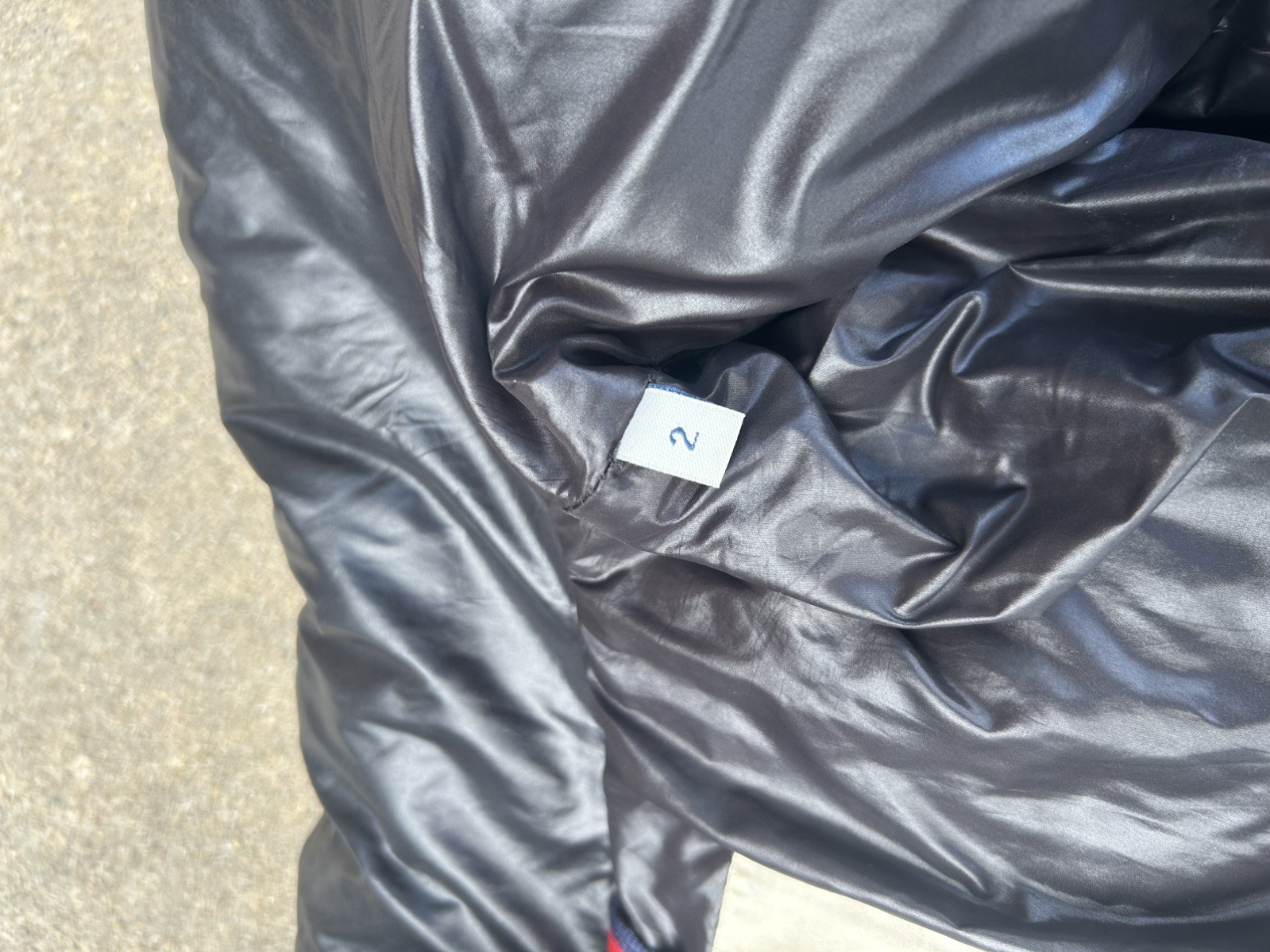 Moncler Black Insulated Zip Up Puffer Jacket with Logo & Zipper Accents