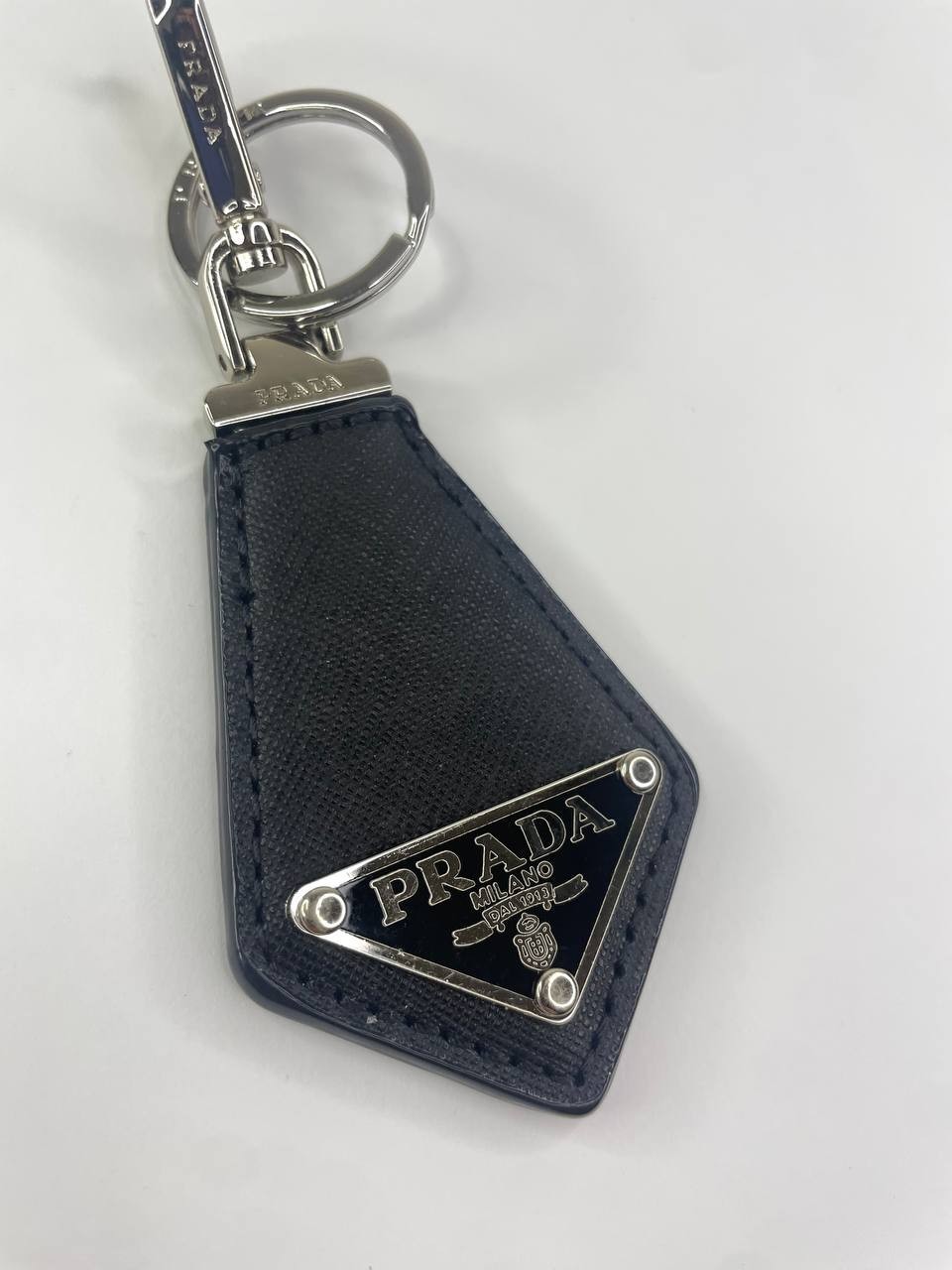 Prada Black Keychain with Silver Tone Hardware Logo