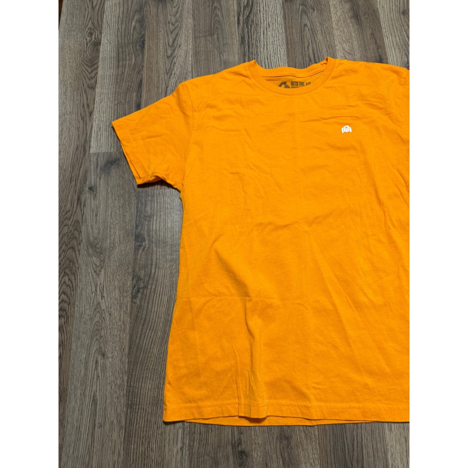 Into The AM Shirt Men’s Size Medium Orange Short Sleeve Shirt Crewneck Logo
