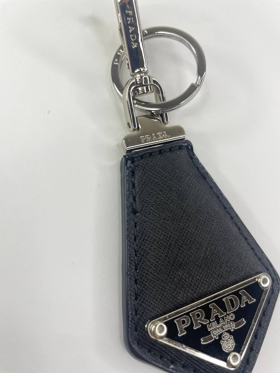 Prada Black Keychain with Silver Tone Hardware Logo