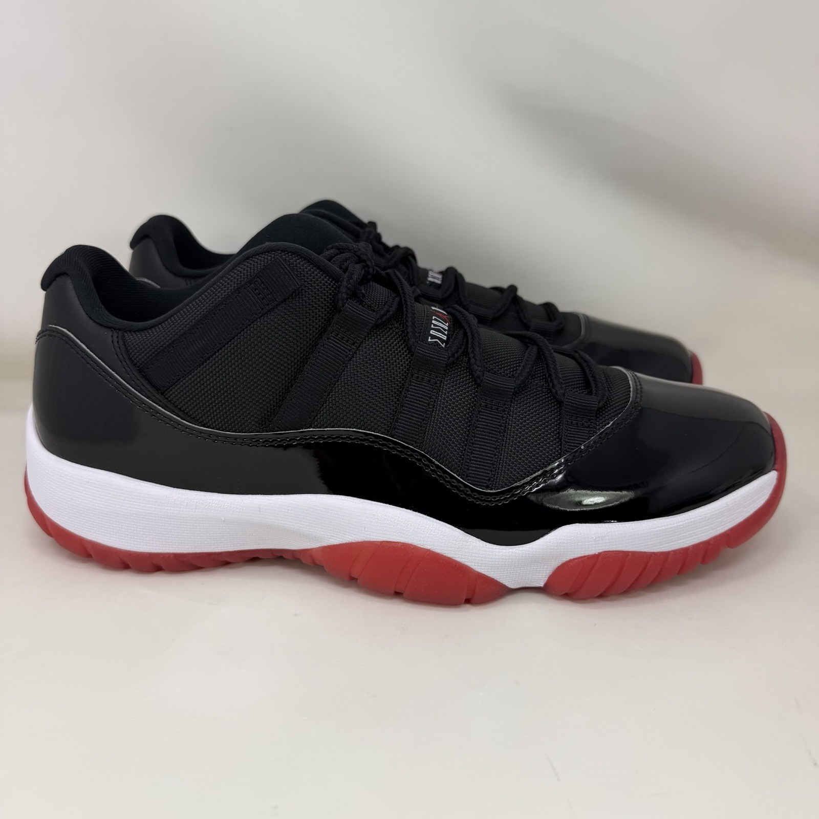 Nike Air Jordan 11 Retro Low Bred Black Varsity Red White Men’s Size 11.5