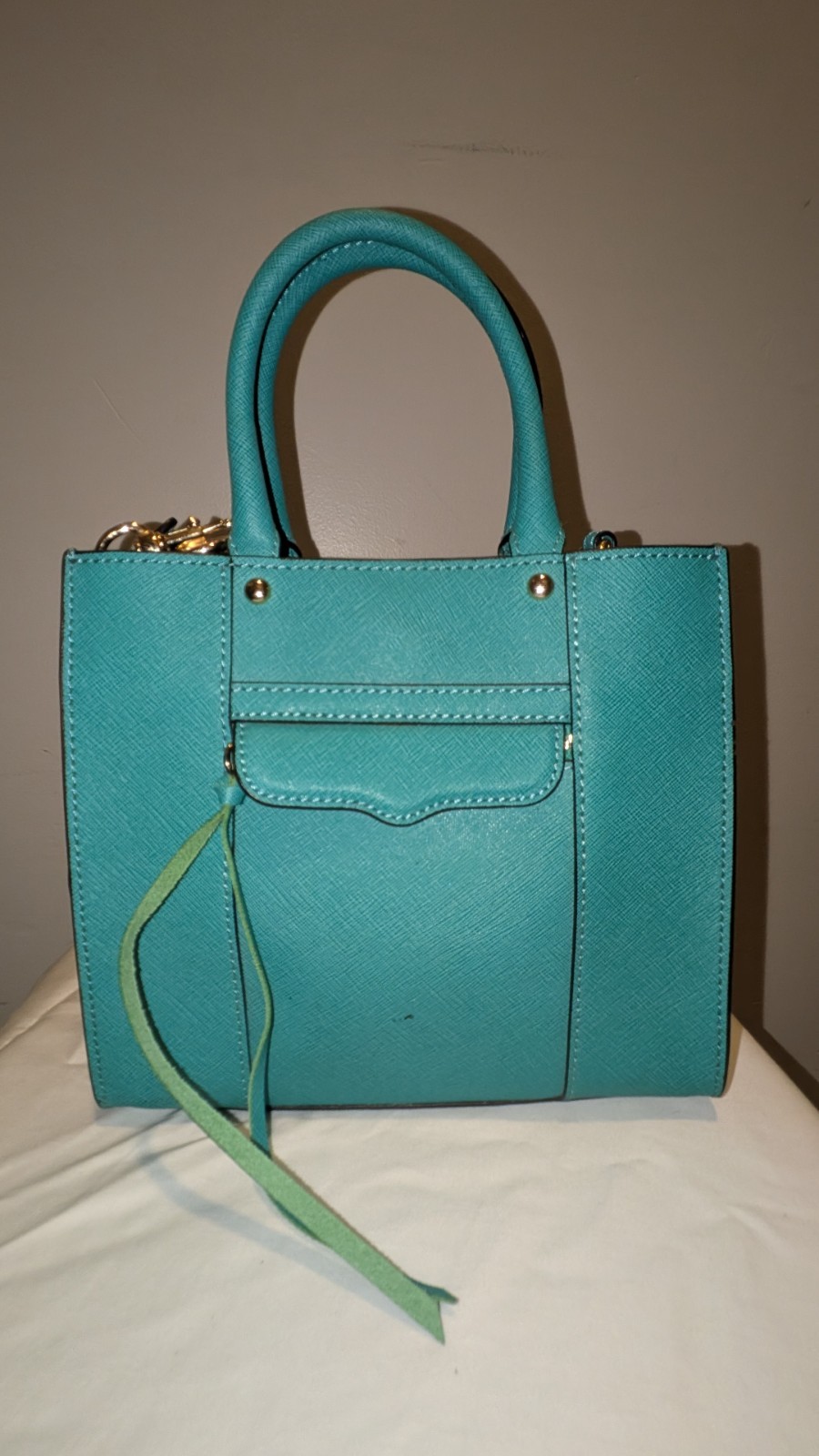 Rebecca Minkoff Mini MAB tote bag teal saffiano leather and gold-tone hardware.