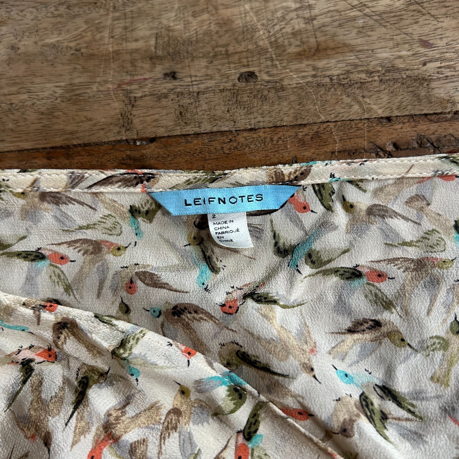 Anthropologie Leifnotes Bird 100% Silk Top Blouse Asymmetrical Neck SIZE 2 EUC