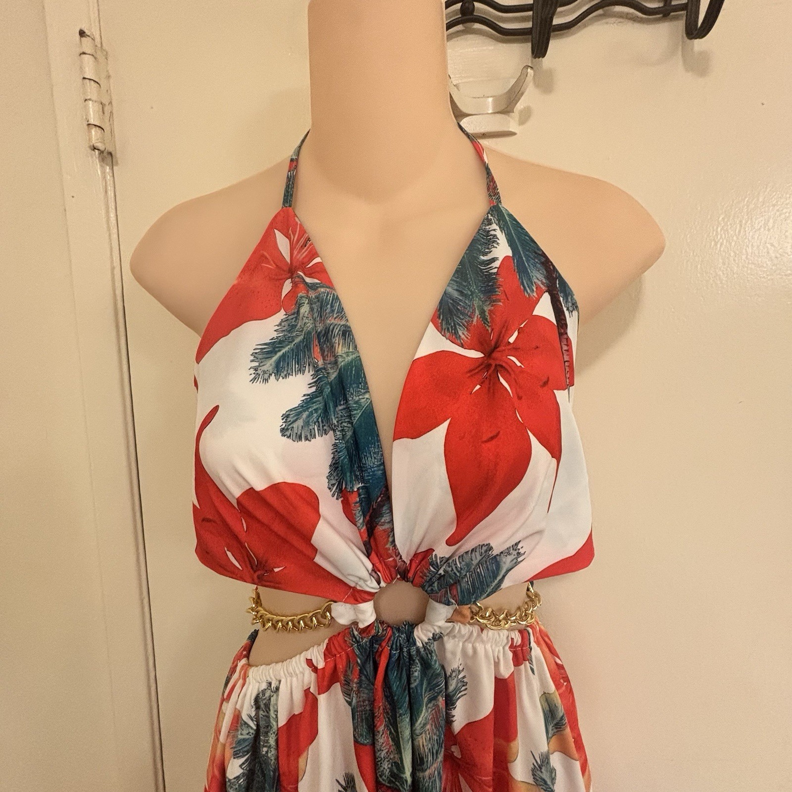 BeachCore tropical print halter maxi dress featuring gold chain cut-out details.