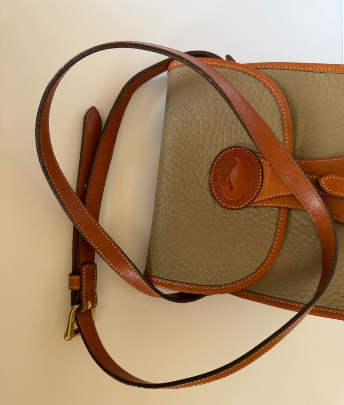 Dooney & Bourke Taupe Pebbled all weather Leather Crossbody with Brown Trim