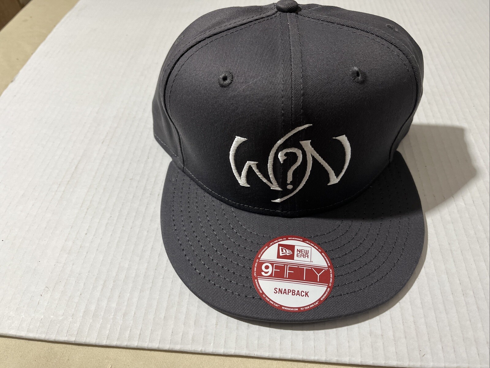 What’s Next New Era 9 Fifty SnapBack Ball Cap New Grey.