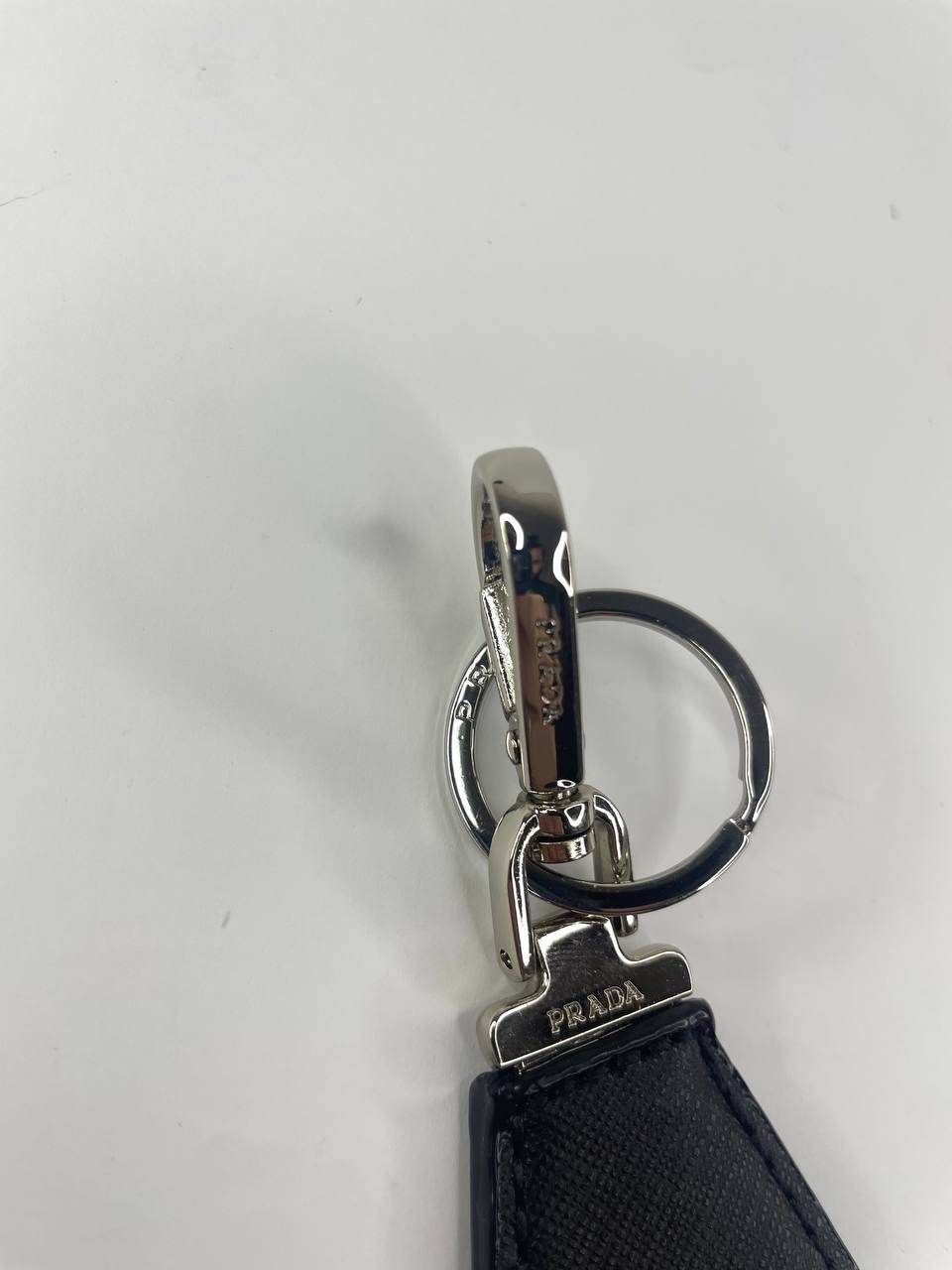 Prada Black Keychain with Silver Tone Hardware Logo