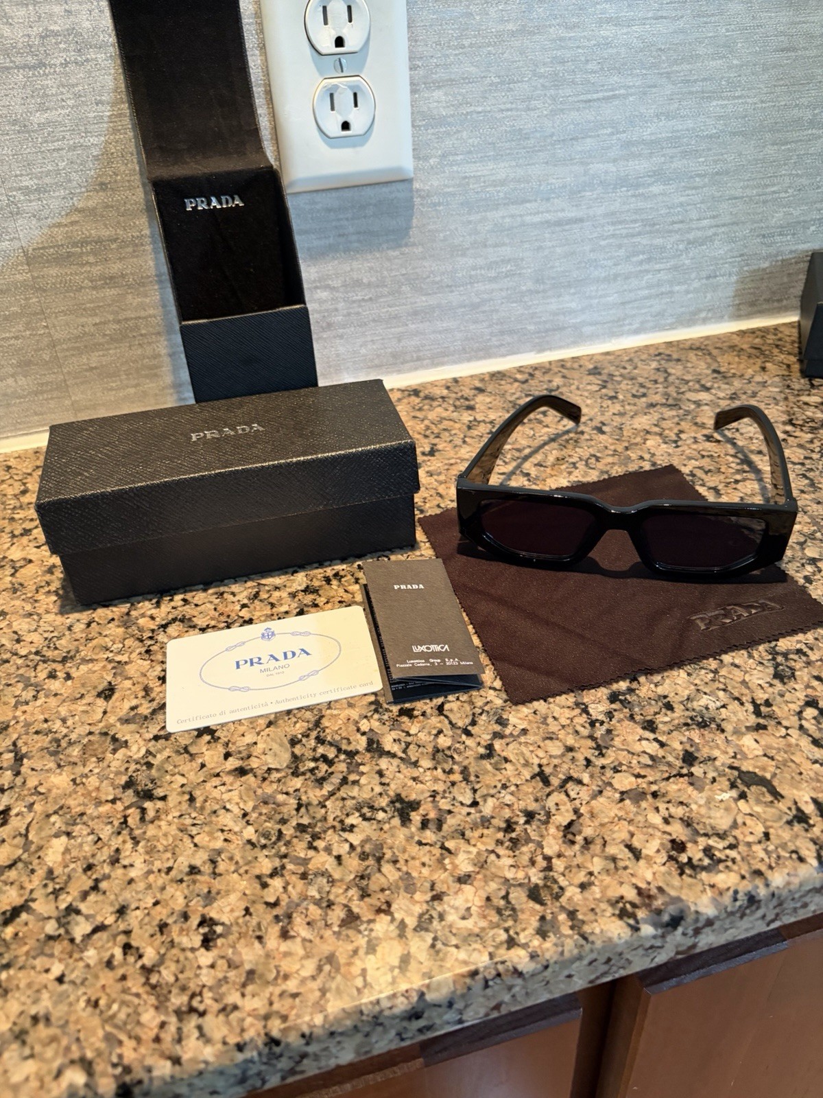 Prada PR17WS 1AB5S049 Women’s Sunglasses 49 mm Black / Dark Grey Lens, gold Logo