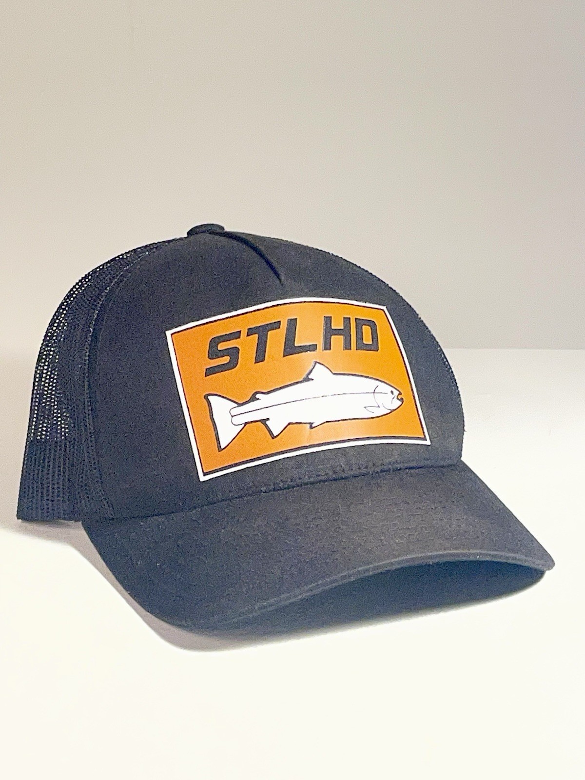 The Classics Men’s Trucker Hat Fish Patch Logo Black Orange Mesh Back Adj L