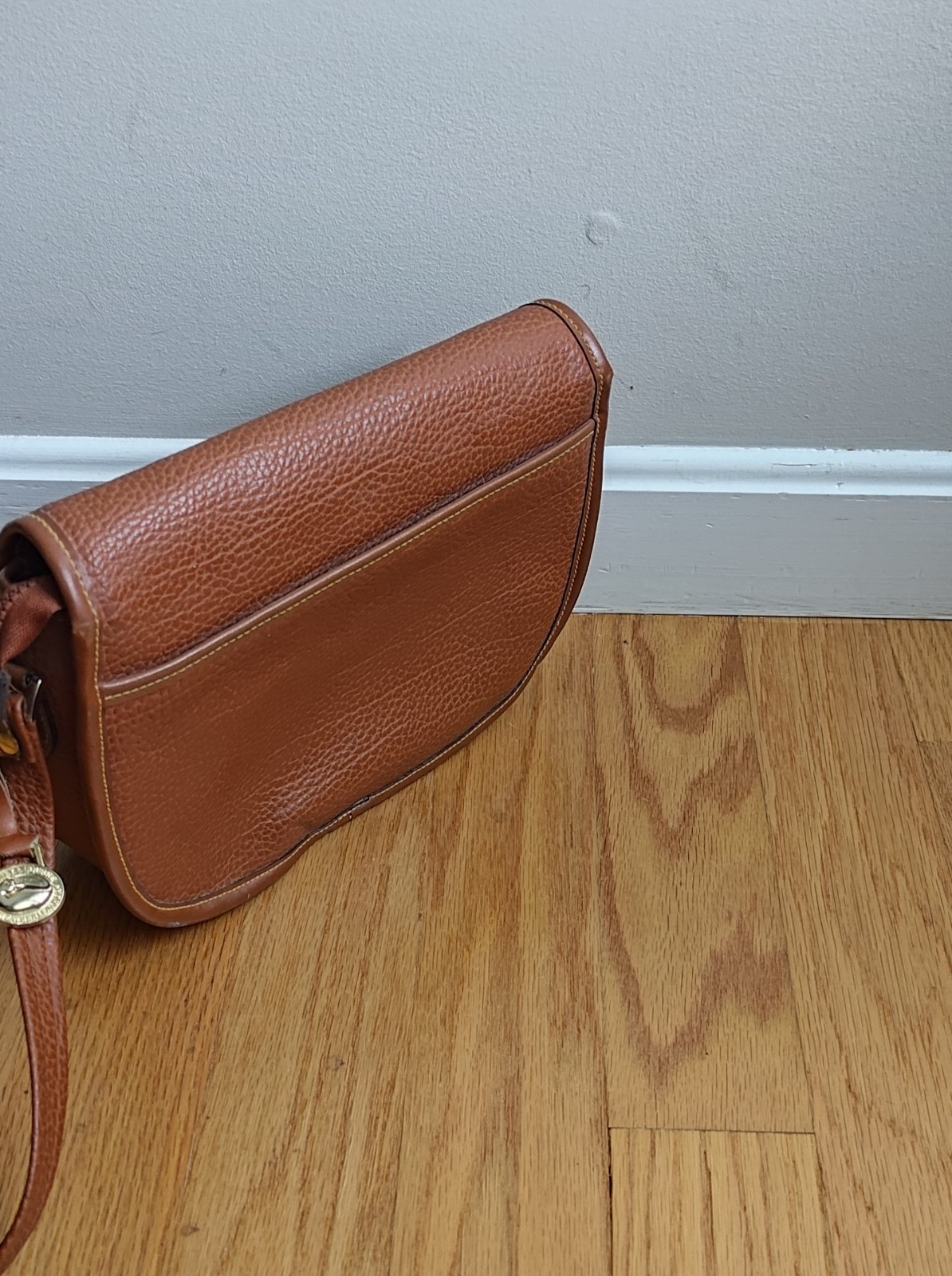 Dooney & Bourke All Weather Leather Duck Bag Color = Brown