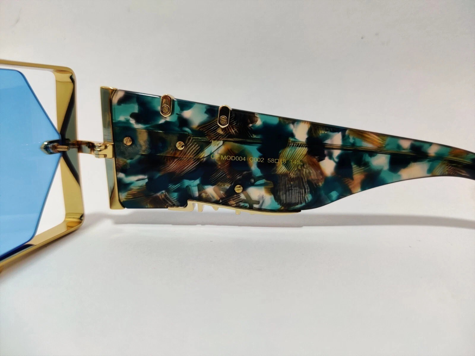 Cazal Modern Blue Tortoise ＆Gold Unisex Sunglasses with Blue Tinted Frame Md004