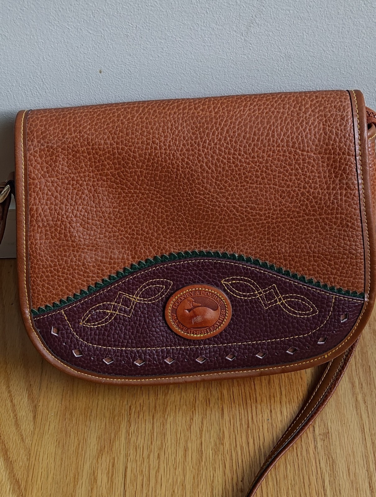 Dooney & Bourke All Weather Leather Duck Bag Color = Brown