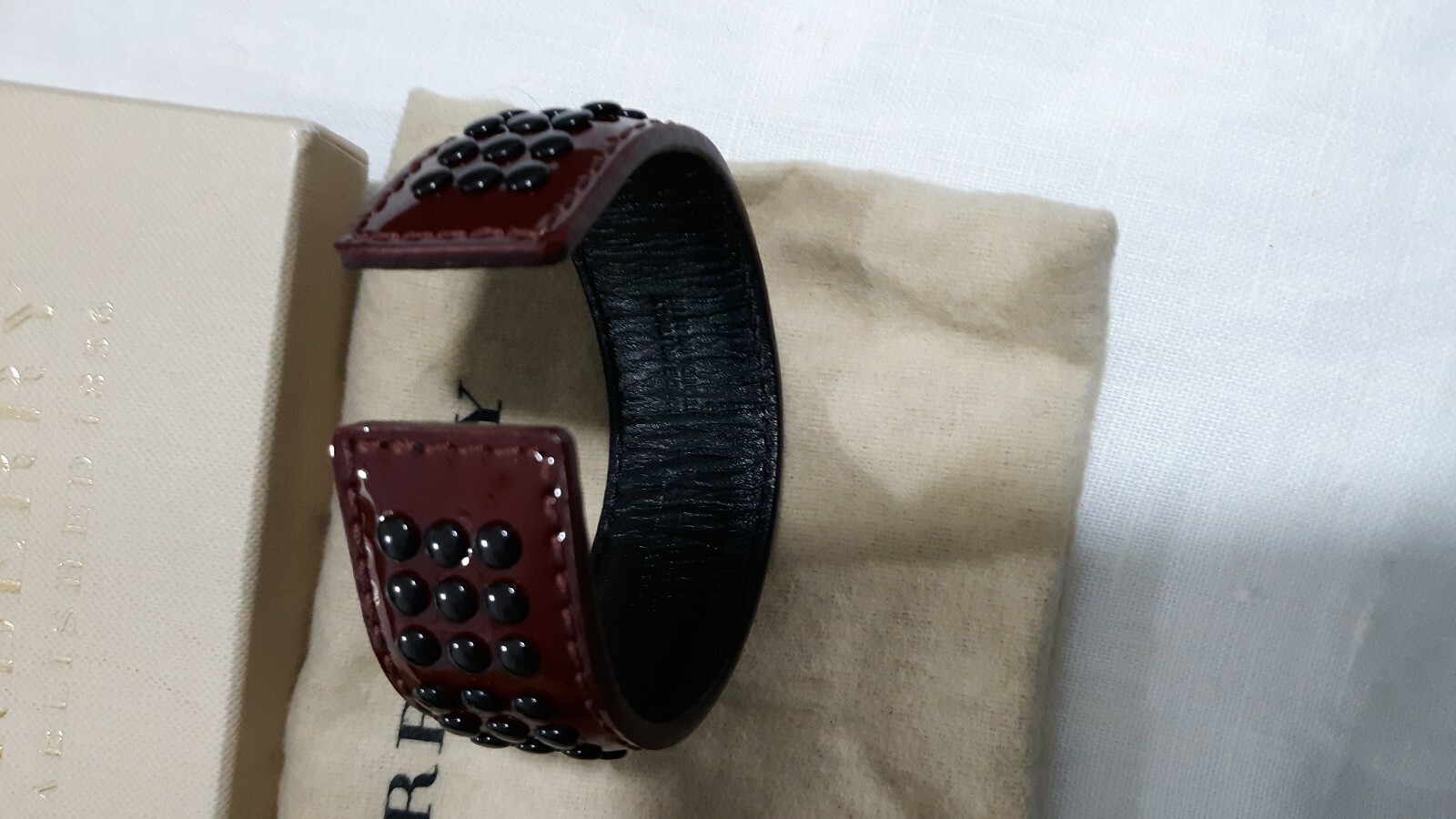 BURBERRY LEATHER CUFF BANGLE BERRY RED BLACK GROMMETS NEW TAGS UNISEX