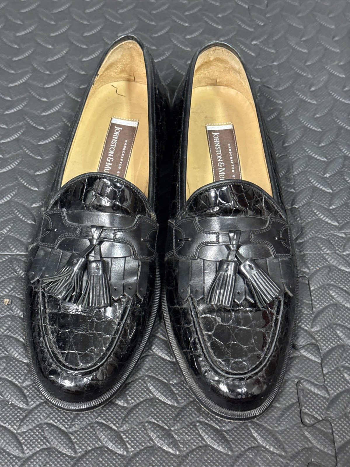 Three Pairs of Johnston and Murphy slip on shoes 9.5