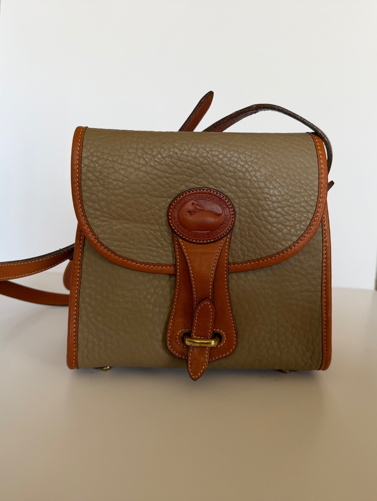 Dooney & Bourke Taupe Pebbled all weather Leather Crossbody with Brown Trim