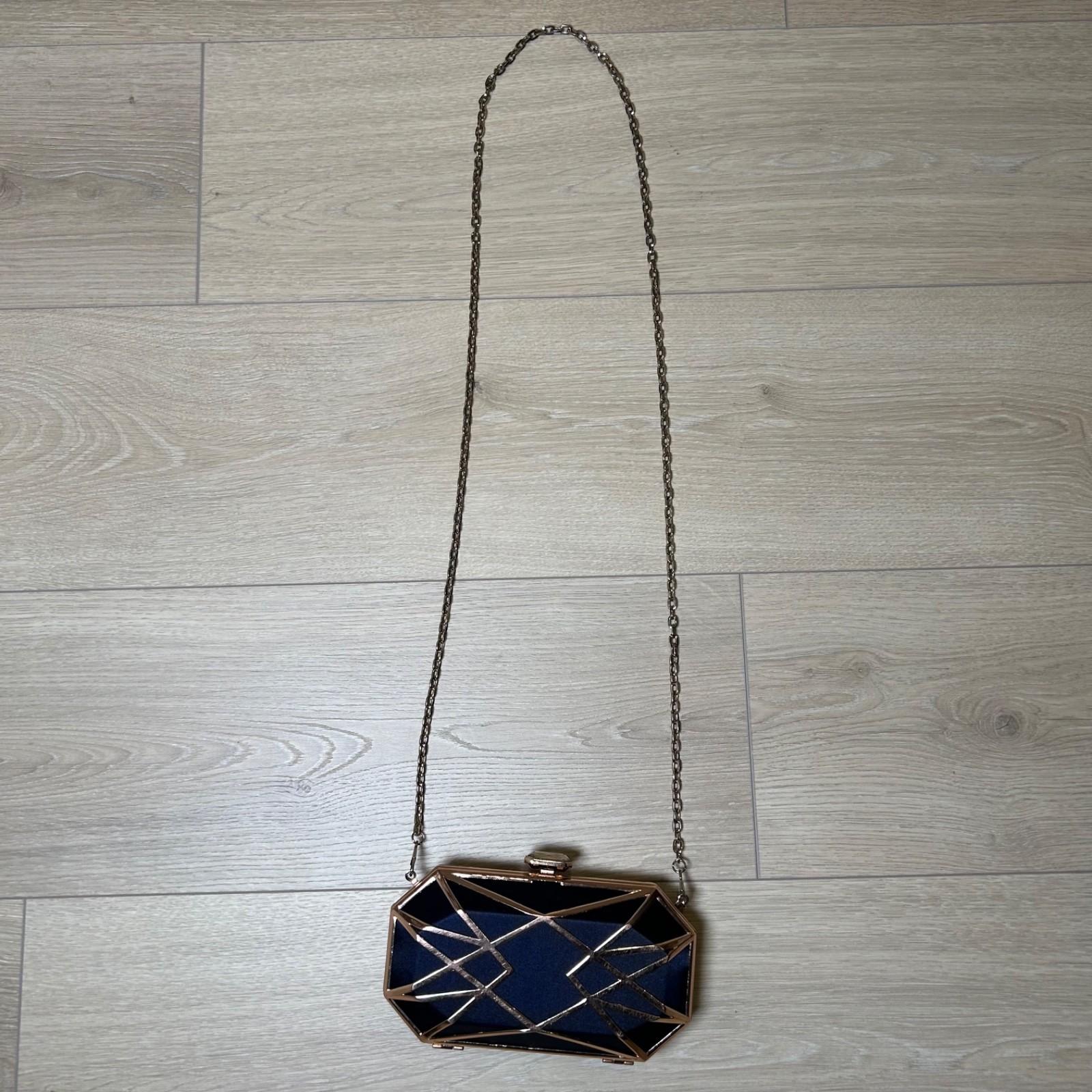 Urban Expressions Navy Blue Gold Clutch Features Hard Shell Design