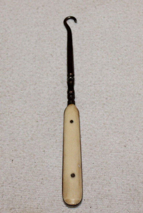 vintage 6 1/4″ shoe or glove button hook with bone handle 2 pins