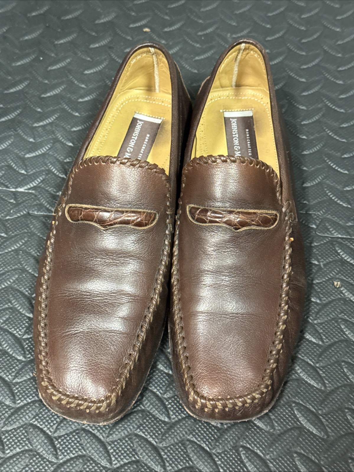 Three Pairs of Johnston and Murphy slip on shoes 9.5
