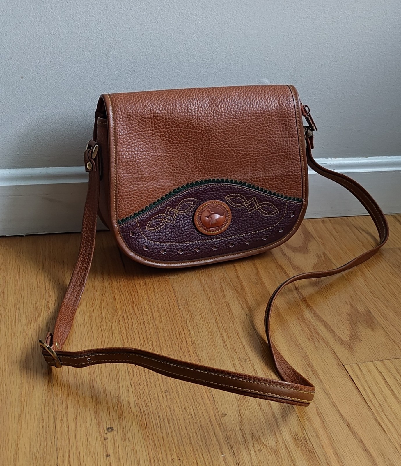 Dooney & Bourke All Weather Leather Duck Bag Color = Brown