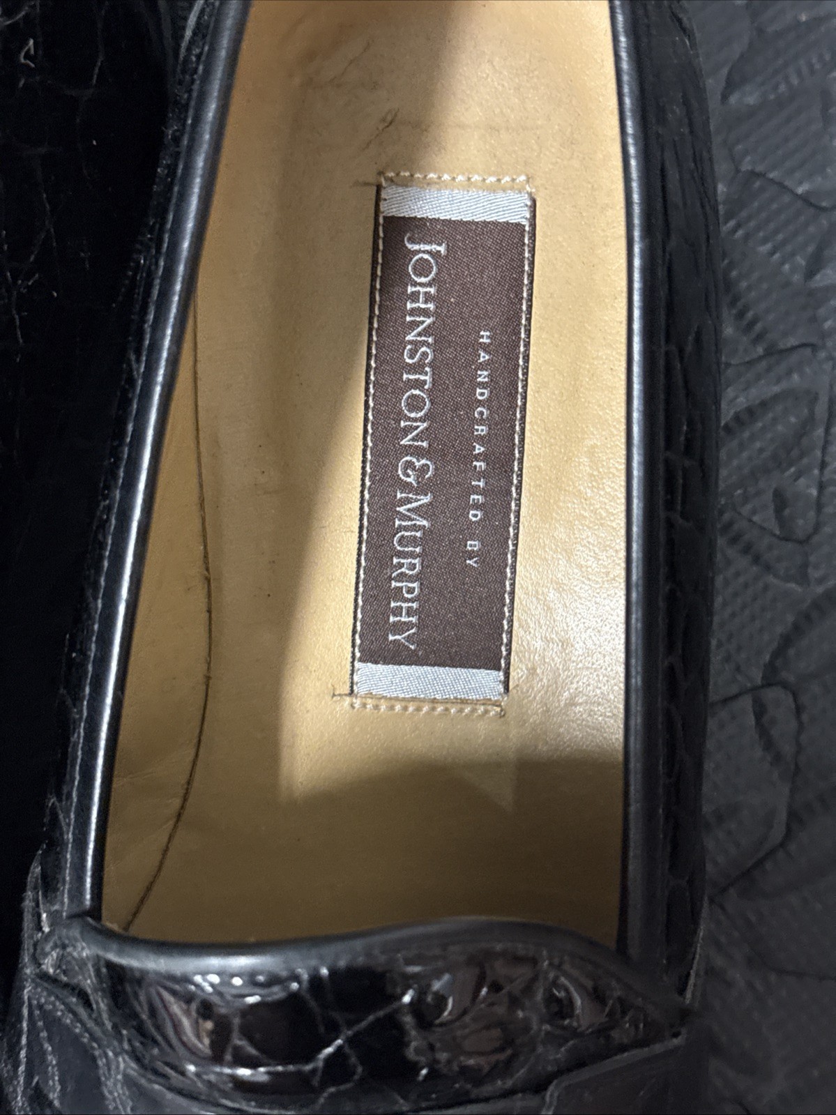 Three Pairs of Johnston and Murphy slip on shoes 9.5