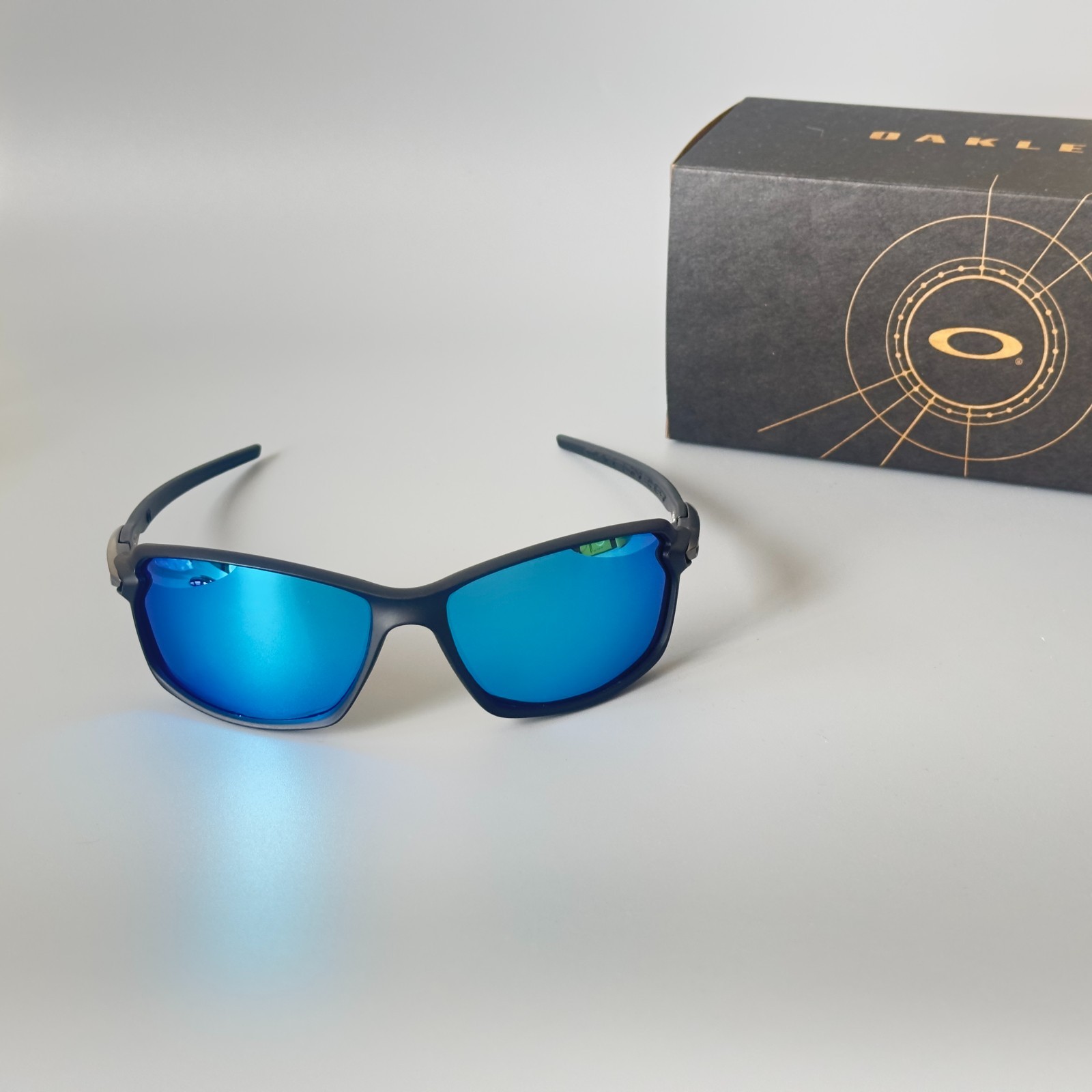 Oakley Carbon Shift OO9302 Matte Black Blue Lens Sunglasses Carbon Fiber
