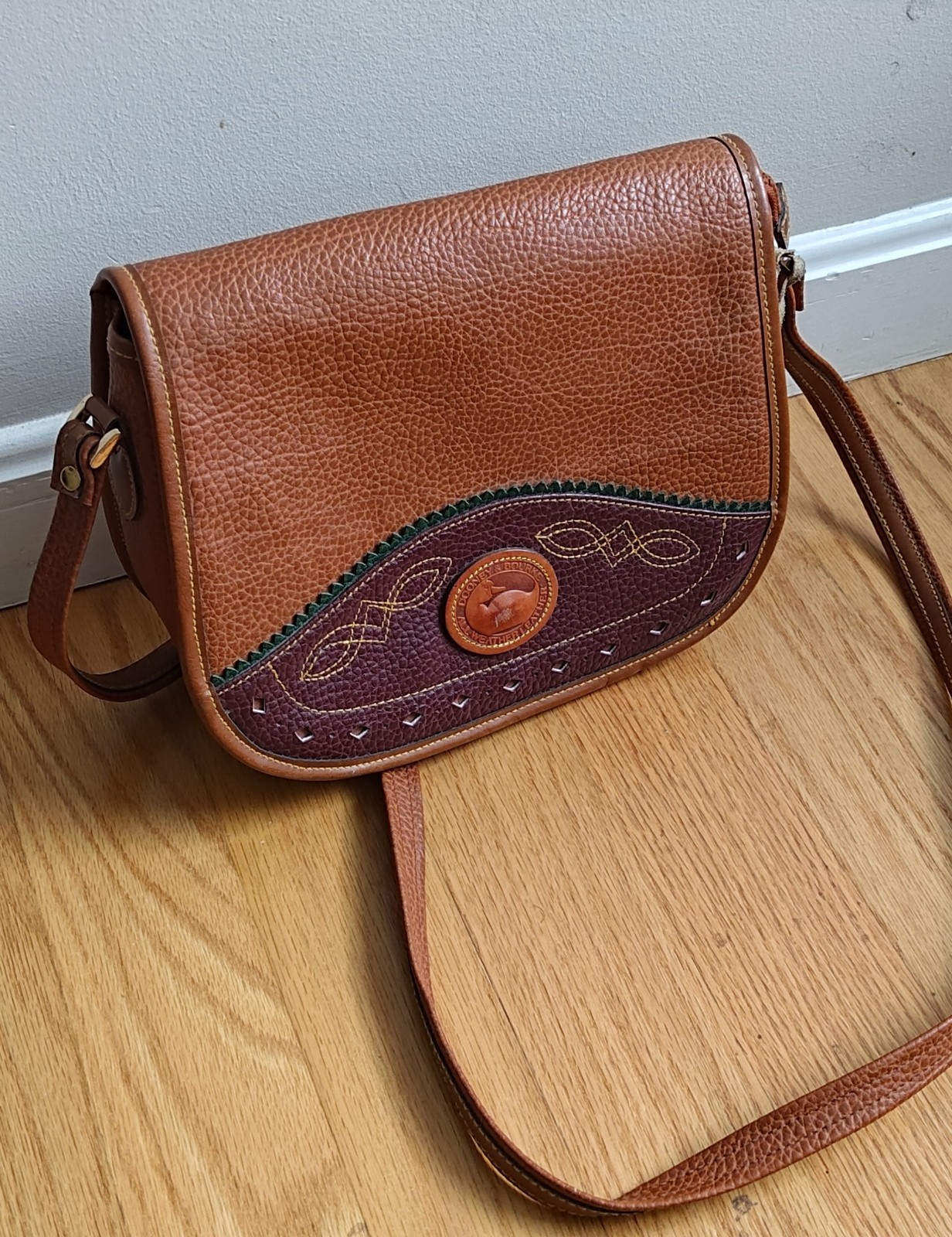 Dooney & Bourke All Weather Leather Duck Bag Color = Brown