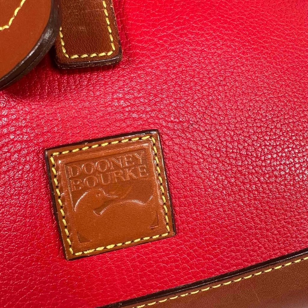 Dooney & Bourke Classic Collection All Weather Pebble Leather Red Tan Backpack