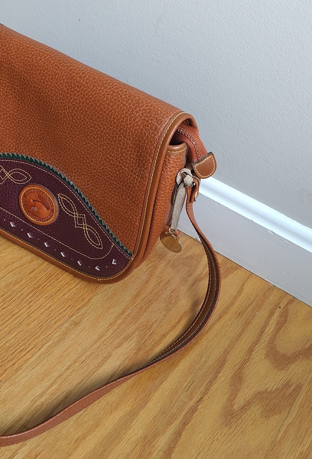 Dooney & Bourke All Weather Leather Duck Bag Color = Brown