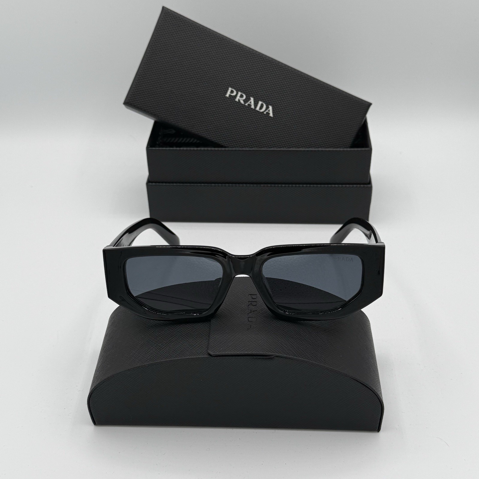 Prada PR 09ZS 1AB5S0 Unisex Sunglasses – Black/Gray